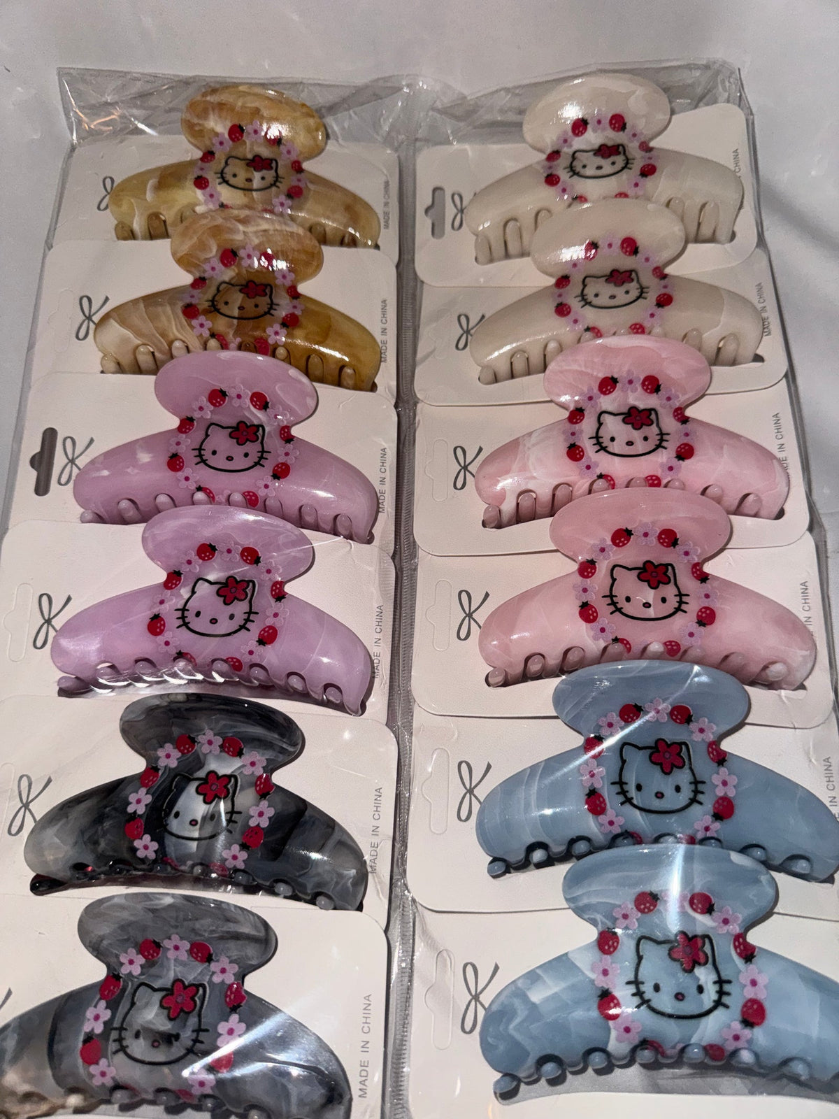 Kitty strawberry hair clips sold wholesale by the dozen – Jen's Best of LA